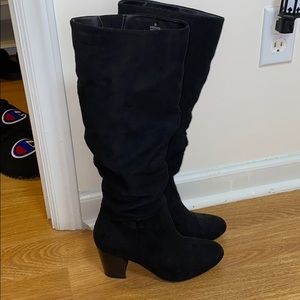 Black below the knee boots